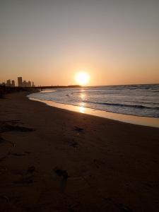 Habitación oliva con baño compartido cerca al aeropuerto