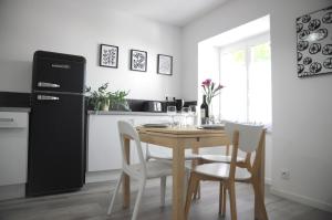 Appartements maison garroenea : photos des chambres