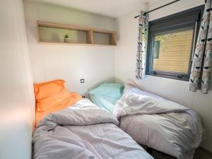 Mobil-home 2 chambres avec terrasse et salon de jardin - API-1-52-448