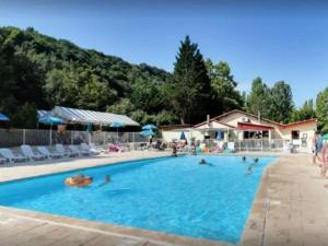 Campings Chalet 2 Chambres avec Terrasse a Badefols-sur-Dordogne - API-1-52-604 : photos des chambres