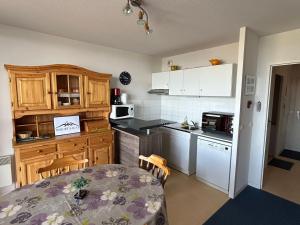 Appartements Appartement 4 pers. a Super Besse avec terrasse sud et garage - FR-1-814-97 : photos des chambres