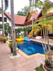 Luxurious and spacious Poolvilla at about 500 mtr from Jomtien Beach with luxurious facility Private Swimming Pool, Jaccuzi,Fitness Room,Table Tennis and many more