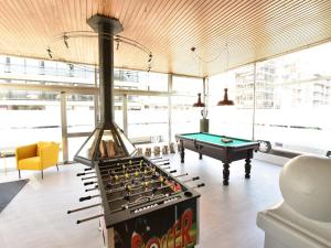 Former hotel in the centre and at 50 metres from the beach in Panne