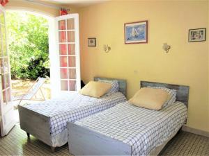 Maisons de vacances A la mer ,VUE MER a la sortie du jardin ! VOS animO , bienvenue ! : photos des chambres