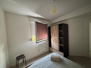 Appartements Logement cosy avec ascenseur : photos des chambres
