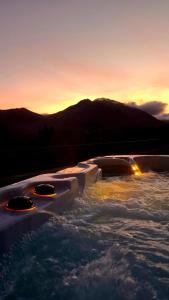 Maisons de vacances Gite des Sommets spa privatif vue panoramique sur les montagnes : photos des chambres
