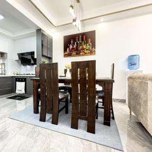 modern executive three bedroom apartment which features a swimming pool, state of the art fully equipped gym andmodern unmatched luxurious facilities which offfers luxury lifestyle
