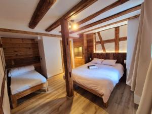 Appartements Gite premium, au Coeur de l'Ours : photos des chambres