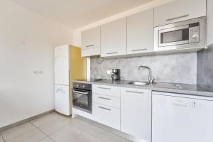 Appartements Lovely 1BR with garden, private parking & Sea View : photos des chambres