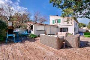 Maisons de vacances Maison pour 10, acces direct a la plage : photos des chambres