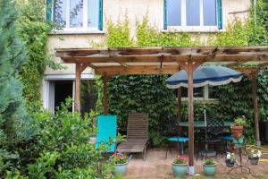 Maisons de vacances Spacious quiet house with pretty garden : photos des chambres