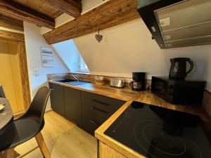 Appartements Gite premium, au Coeur de l'Ours : photos des chambres
