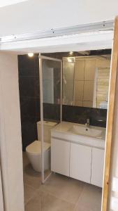 Appartements Appartement avec parking : photos des chambres