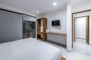 Bright 2BR in Aldea Zama with Rooftop Pool & Wi-Fi