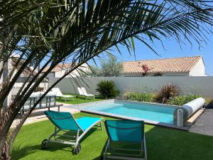 Villas Villa moderne avec piscine proche de la plage : photos des chambres