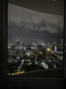 24th Floor City View at Calyx Residences with infinity pool