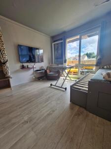 Appartements Cosy & Charming logement moderne proche Paris : photos des chambres