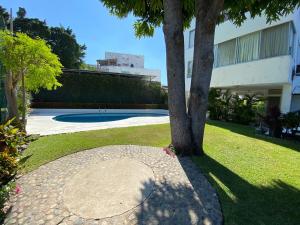 Departamento con vista al mar y campo de Golf