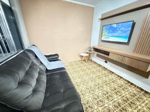 Pé na Areia Praia da Guilhermina VI