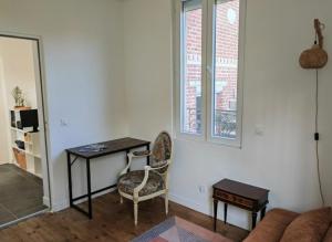 Sejours chez l'habitant Chambres cozy a deux pas de Paris : photos des chambres