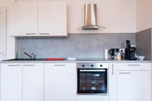 Appartements La Pause Peronnaise - Maison de ville en coeur de village : photos des chambres