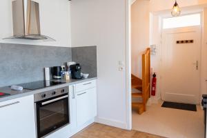 Appartements La Pause Peronnaise - Maison de ville en coeur de village : photos des chambres