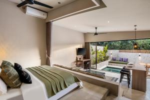 Sunrise Lush River Villa by Alfred in Bali