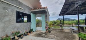 A small house next to the canal