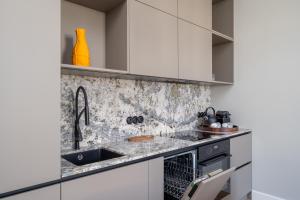 Bold 1909 Residences - Art Nouveau Living