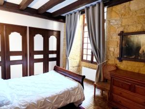 Maisons de vacances Demeure du XIIIe-XIVe s. dans la cite medievale. : photos des chambres