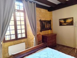 Maisons de vacances Demeure du XIIIe-XIVe s. dans la cite medievale. : photos des chambres