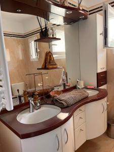 Maisons de vacances La maison de violette piscine et mer : photos des chambres