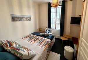 Appartements Le Nid De Merville : photos des chambres