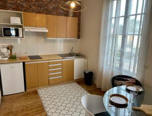 Appartements Le Nid De Merville : photos des chambres