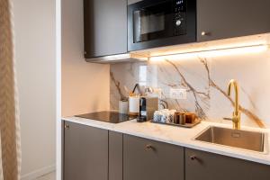 Appartements Bright Designer Studio - Montorgueil Paris Center - AirCon : photos des chambres