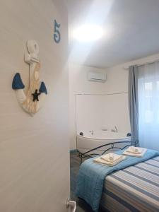 Camera King con Balcone e Vasca da Bagno con Idromassaggio