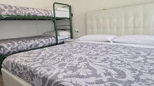 Quadruple Room with Shared Bathroom