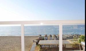 Beachfront Apartment In Mijas Costa 2-1A