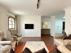 Relaxing Garden View 3BR Spacious Apartment in New Cairo