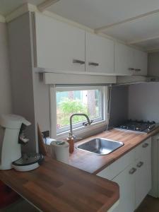 Sfeervolle woodlodge op 5 sterren vakantiepark Krieghuusbelten