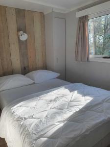 Sfeervolle woodlodge op 5 sterren vakantiepark Krieghuusbelten