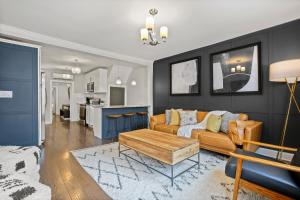 Charming 4BR with Private Patio and Historic Row Downtown