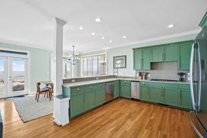 Salty Beach by Coastline Vacation Rentals