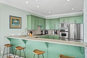 Salty Beach by Coastline Vacation Rentals