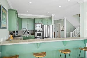 Salty Beach by Coastline Vacation Rentals