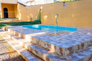 Casa Alegria piscina churrasqueira