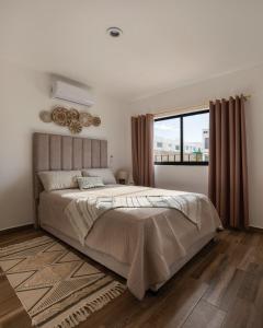 A residence with 4 bedrooms in a private community with a swimming pool