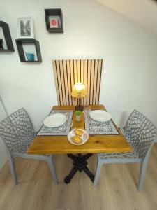 Appartements Studio Proche Centre ville avec Place de Stationnement : photos des chambres