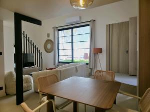 Appartements Le Faubourg : photos des chambres