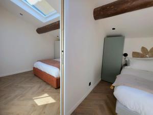 Appartements Le Faubourg : photos des chambres